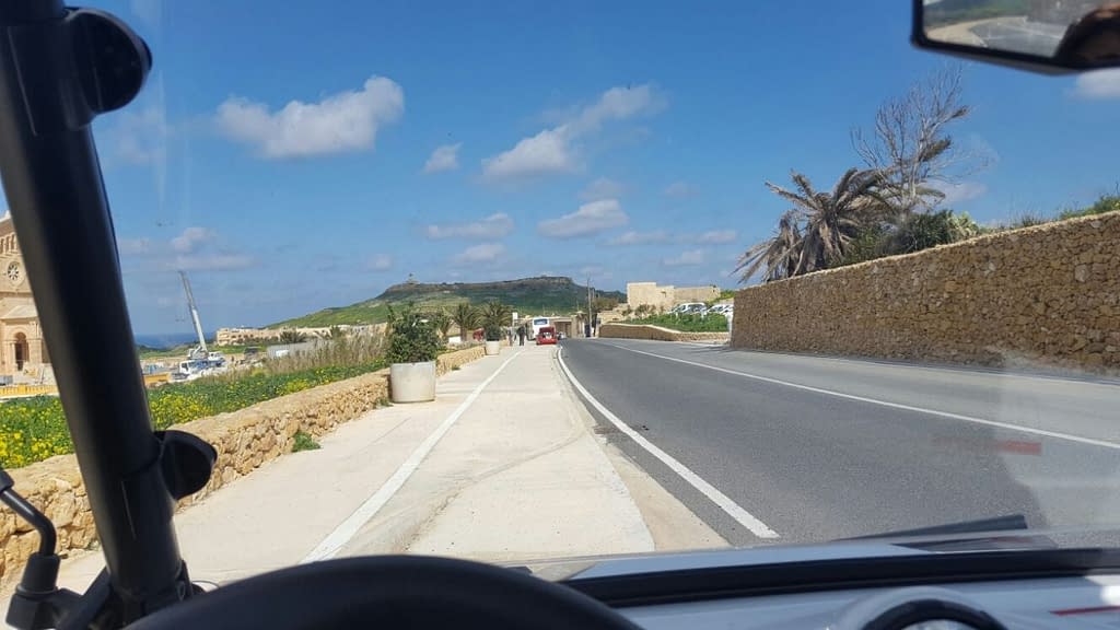 Driving along Ta' Pinu Cathedral in Gozo